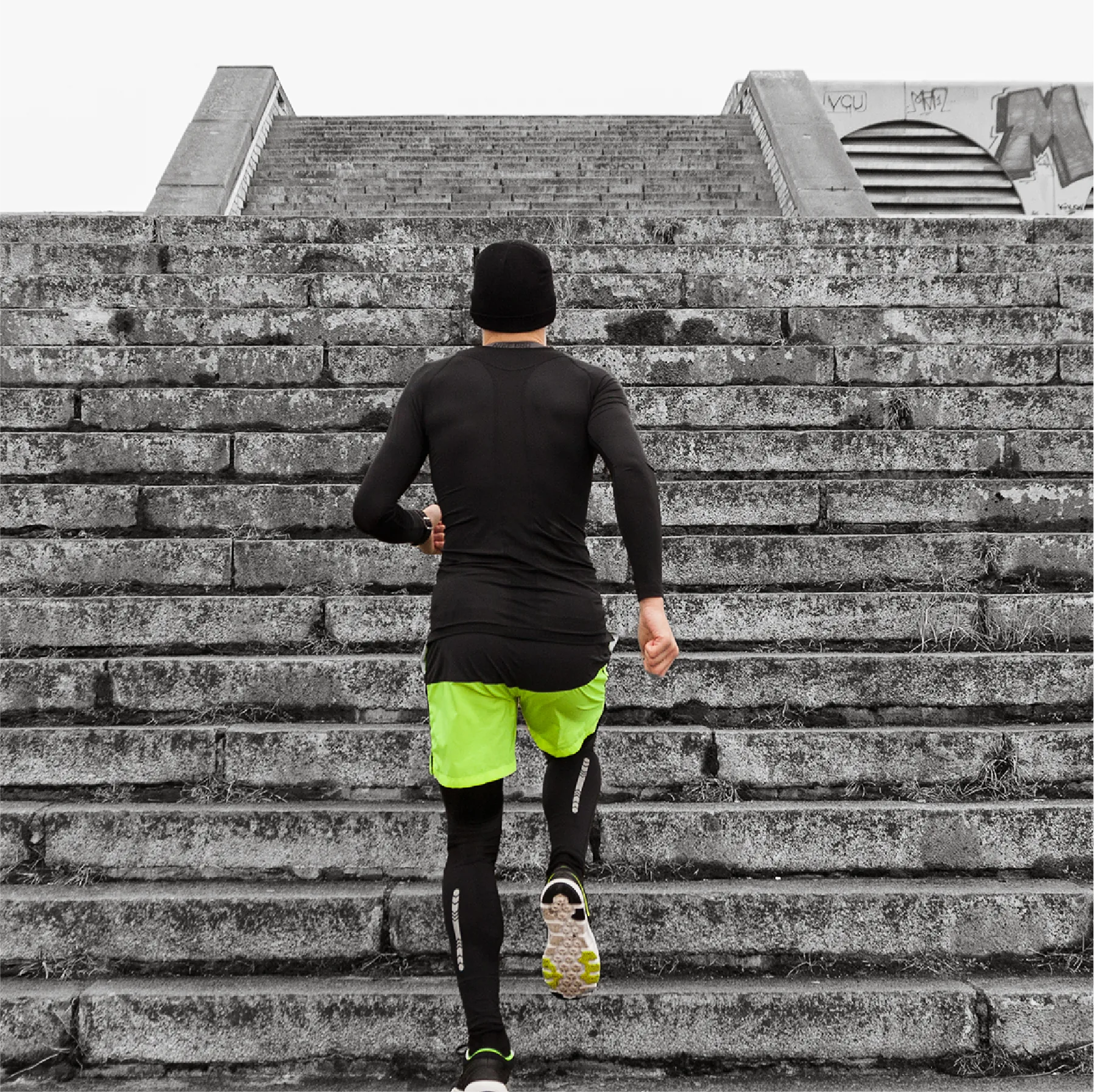 Runner on concrete stairs, Harmony brand photography